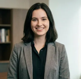 Confident real estate advisor in business formal attire