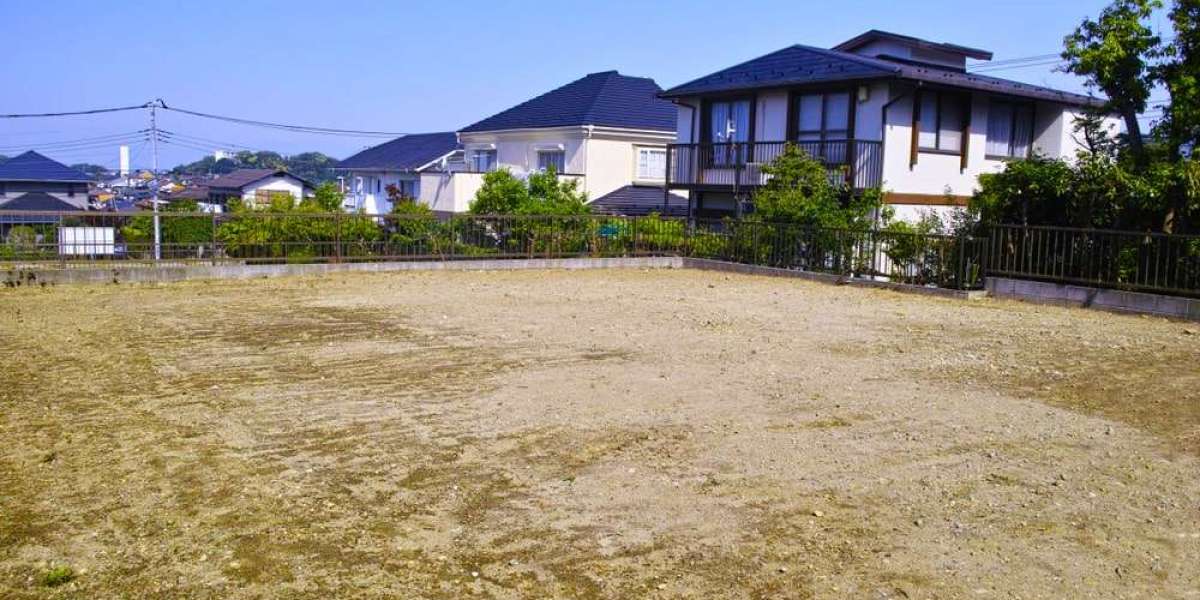 Residential land for sale with nearby houses and clear space